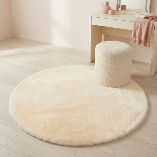 Bunny Round Rug under a vanity stool (stool not included)