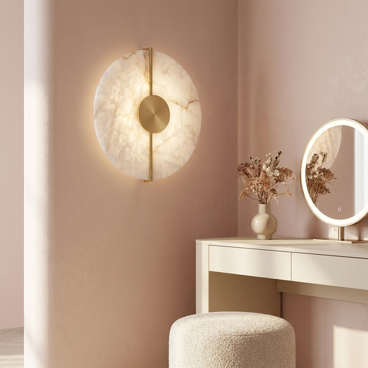 Selene Alabaster Sconce beside a vanity table (props not included)