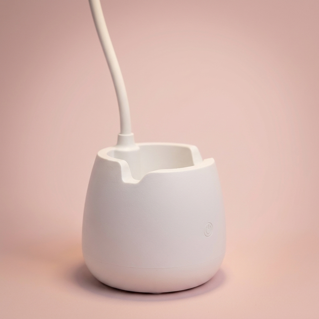 Lumi Desk Lamp, pen cup and phone slot in the base