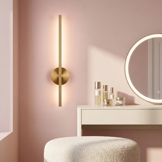 Vela Cordless Wall Sconce beside a vanity mirror (props not included)